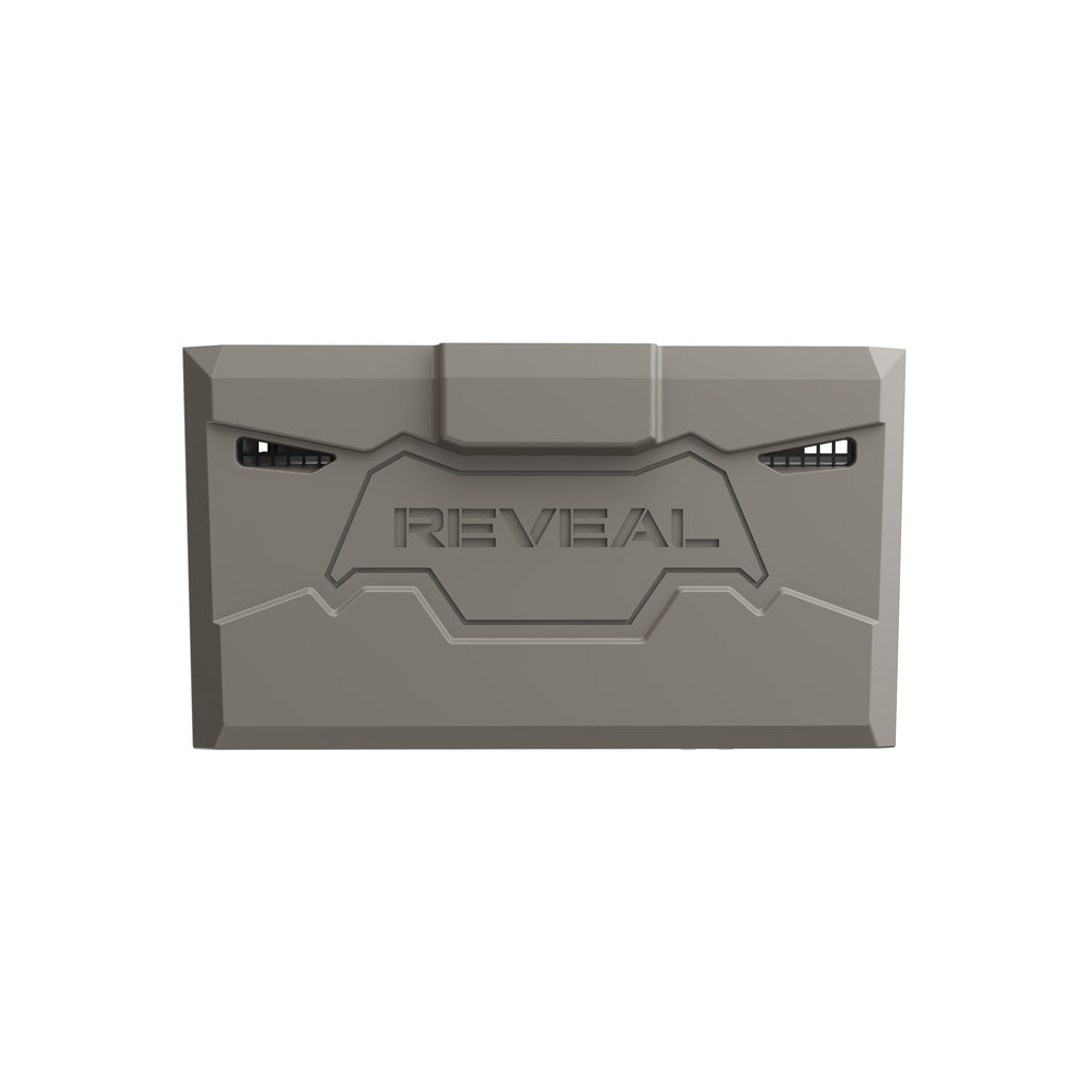A gray rectangular lithium battery pack with the brand name 'REVEAL' embossed in the center, shown against a plain white background.