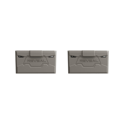 Two gray REVEAL branded lithium battery packs shown side by side on a plain white background.