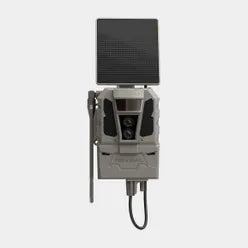 A gray and black electronic device with a rectangular black panel on top, mounted on a stand with a hanging cable, shown against a light gray background.