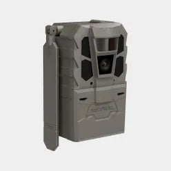 A rugged gray tactical trail camera with a side-mounted flip-out antenna, featuring a prominent front lens and the brand name 'REVEAL' embossed on the lower front, set against a plain light gray background.